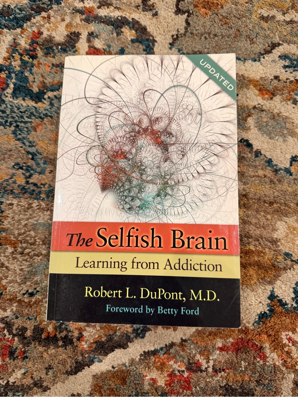 The Selfish Brain — Orange and Black Cover Edition